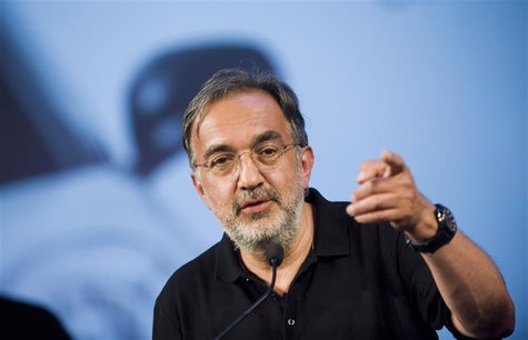 Fiat-Chrysler chief executive Sergio Marchionne gestures during the official presentation of the new Fiat 500L car in downtown Turin July 3, Fiat-Chrysler chief executive Sergio Marchionne gestures during the official presentation of the new Fiat 500L car in downtown Turin July 3,