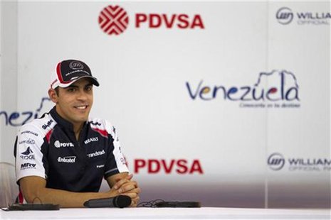 Williams Formula One F1 driver Pastor Maldonado of Venezuela attends a news conference in Caracas August 10, 2012. Maldonado will perform a Williams Formula One F1 driver Pastor Maldonado of Venezuela attends a news conference in Caracas August 10, 2012. Maldonado will perform a