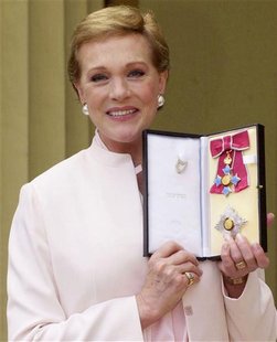 Dame Julie Andrews, star of Mary Poppins and the Sound of Music, shows off her award after receiving the honour of Dame Commander of the Ord Dame Julie Andrews, star of Mary Poppins and the Sound of Music, shows off her award after receiving the honour of Dame Commander of the Ord