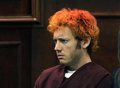Colorado shooting suspect James Eagan Holmes makes his first court appearance in Aurora, Colorado, July 23, 2012. REUTERS/RJ Sangosti/Pool Colorado shooting suspect James Eagan Holmes makes his first court appearance in Aurora, Colorado, July 23, 2012. REUTERS/RJ Sangosti/Pool