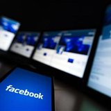 The loading screen of the Facebook application on a mobile phone is seen in this photo illustration taken in Lavigny May 16, 2012. REUTERS/V The loading screen of the Facebook application on a mobile phone is seen in this photo illustration taken in Lavigny May 16, 2012. REUTERS/V