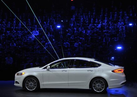 The 2013 Ford Fusion is unveiled on the first press preview day for the North American International Auto Show in Detroit, Michigan, January The 2013 Ford Fusion is unveiled on the first press preview day for the North American International Auto Show in Detroit, Michigan, January