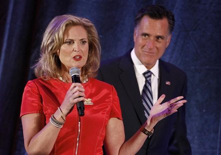 U.S. Republican presidential nominee and former Massachusetts Governor Mitt Romney (R) listens to his wife Ann speak at a campaign fundraise U.S. Republican presidential nominee and former Massachusetts Governor Mitt Romney (R) listens to his wife Ann speak at a campaign fundraise