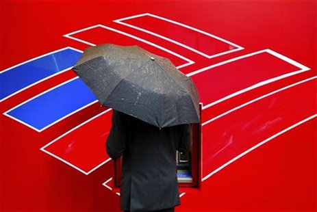A Bank of America customer uses an ATM in Charlotte, North Carolina April 18, 2012. REUTERS/Chris Keane A Bank of America customer uses an ATM in Charlotte, North Carolina April 18, 2012. REUTERS/Chris Keane