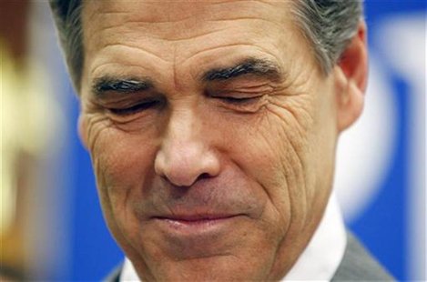 Texas Governor Rick Perry announces he is dropping his run for the Republican U.S. presidential nomination during a news conference in Charl Texas Governor Rick Perry announces he is dropping his run for the Republican U.S. presidential nomination during a news conference in Charl