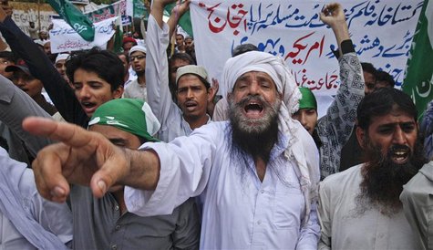 Supporters of the religious political party Markazi Jamiat Ahlehadith Pakistan shout slogans during a protest against an anti-Islam film mad Supporters of the religious political party Markazi Jamiat Ahlehadith Pakistan shout slogans during a protest against an anti-Islam film mad
