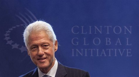 Former U.S. President Bill Clinton stands in front of the logo of the Clinton Global Initiative 2012 (CGI) during the first day of the CGI i Former U.S. President Bill Clinton stands in front of the logo of the Clinton Global Initiative 2012 (CGI) during the first day of the CGI i