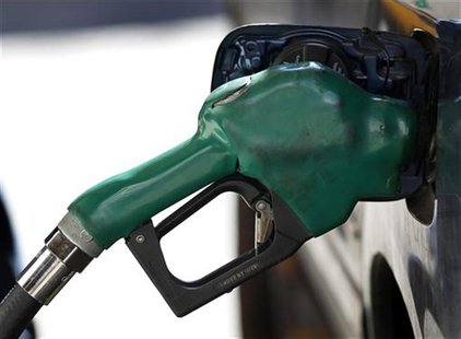 A gas nozzle is used to pump petrol at a station in New York February 22, 2011. REUTERS/Shannon Stapleton A gas nozzle is used to pump petrol at a station in New York February 22, 2011. REUTERS/Shannon Stapleton