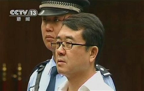 Former police chief Wang Lijun attends a court hearing in Chengdu in this still image taken from video September 18, 2012. REUTERS/CCTV via Former police chief Wang Lijun attends a court hearing in Chengdu in this still image taken from video September 18, 2012. REUTERS/CCTV via