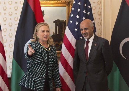 U.S. Secretary of State Hillary Clinton meets with Libyan leader Mohammed Magarief on the sidelines of the United Nations General Assembly i U.S. Secretary of State Hillary Clinton meets with Libyan leader Mohammed Magarief on the sidelines of the United Nations General Assembly i