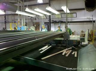 Workers at WD Flooring in Laona, Monday, September 24, 2012. (courtesy of FOX 11). Workers at WD Flooring in Laona, Monday, September 24, 2012. (courtesy of FOX 11).