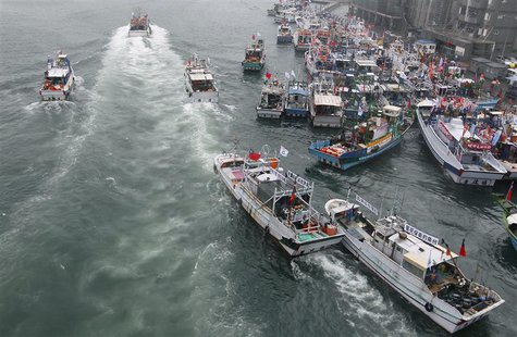 Several dozen fishing boats set off to the disputed islands, called Senkaku in Japan, Diaoyutai in China and Tiaoyutai in Taiwan, from Suao Several dozen fishing boats set off to the disputed islands, called Senkaku in Japan, Diaoyutai in China and Tiaoyutai in Taiwan, from Suao