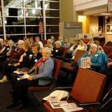 Ladies wait patiently for their veterans to come home from the Never Forgotten Honor Flight, September 24, 2012 Ladies wait patiently for their veterans to come home from the Never Forgotten Honor Flight, September 24, 2012