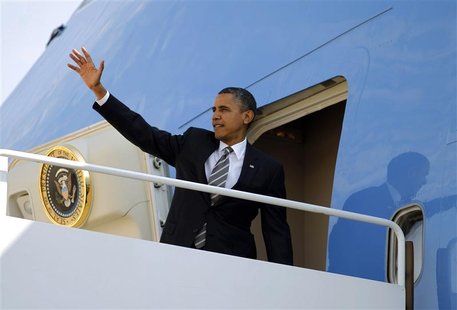 U.S. President Barack Obama waves from Air Force One at Andrews Air Force Base near Washington, September 26, 2012. Obama is traveling to Oh U.S. President Barack Obama waves from Air Force One at Andrews Air Force Base near Washington, September 26, 2012. Obama is traveling to Oh