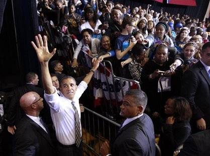U.S. President Barack Obama greets supporters at the end of his election campaign rally at Kent State University, Ohio, September 26, 2012. U.S. President Barack Obama greets supporters at the end of his election campaign rally at Kent State University, Ohio, September 26, 2012.