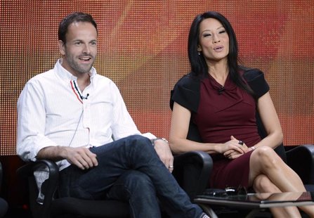 Cast members Jonny Lee Miller (L) and Lucy Liu participate in a panel for CBS series "Elementary" during the CBS sessions at the Television Cast members Jonny Lee Miller (L) and Lucy Liu participate in a panel for CBS series "Elementary" during the CBS sessions at the Television
