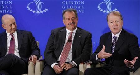 Lloyd Blankfein (L), Chairman and CEO of Goldman Sachs, Andrew Liveris (C), Chairman and CEO of the Dow Chemical Company, and John Chambers, Chairman and CEO of Cisco, participate in a group discussion on ''Business by Design: Business with Integrity'' during the second day of the Clinton Global Initiative 2012 (CGI) in New York on September 24, 2012. Lloyd Blankfein (L), Chairman and CEO of Goldman Sachs, Andrew Liveris (C), Chairman and CEO of the Dow Chemical Company, and John Chambers, Chairman and CEO of Cisco, participate in a group discussion on ''Business by Design: Business with Integrity'' during the second day of the Clinton Global Initiative 2012 (CGI) in New York on September 24, 2012.