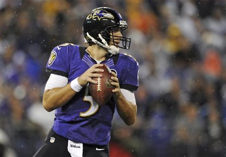 Baltimore Ravens quarteback Joe Flacco looks to pass against the Cleveland Browns during NFL football action in Baltimore, Maryland Septembe Baltimore Ravens quarteback Joe Flacco looks to pass against the Cleveland Browns during NFL football action in Baltimore, Maryland Septembe