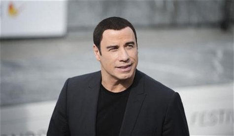 U.S. actor John Travolta poses during a photocall to promote the film Savages on the third day of the San Sebastian Film Festival September U.S. actor John Travolta poses during a photocall to promote the film Savages on the third day of the San Sebastian Film Festival September