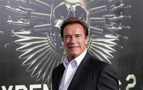 Cast member Arnold Schwarzenegger poses at the premiere of "The Expendables 2" at the Grauman's Chinese theatre in Hollywood, California Aug Cast member Arnold Schwarzenegger poses at the premiere of "The Expendables 2" at the Grauman's Chinese theatre in Hollywood, California Aug
