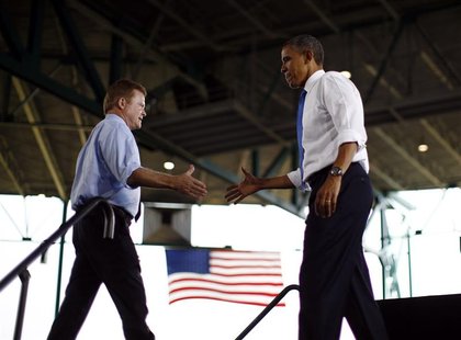U.S. President Barack Obama shakes hands with U.S. Senator Jim Webb (D-VA) at an election campaign rally in Virginia Beach, September 27, 20 U.S. President Barack Obama shakes hands with U.S. Senator Jim Webb (D-VA) at an election campaign rally in Virginia Beach, September 27, 20
