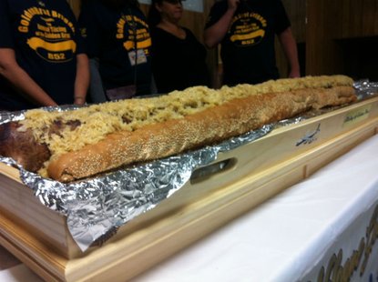 65 pound, 6-foot-long bratwurst at Octoberfest 2012 in La Crosse Wisconsin, made by Bakalars Sausage Co. as a fundraiser for the American Legion. 65 pound, 6-foot-long bratwurst at Octoberfest 2012 in La Crosse Wisconsin, made by Bakalars Sausage Co. as a fundraiser for the American Legion.