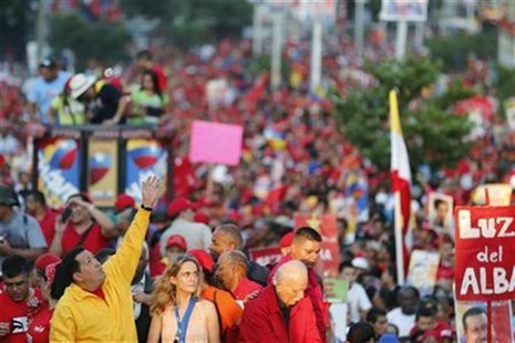Venezuela's President Hugo Chavez waves at supporters during a campaign rally in Guarenas in the state of Miranda September 29, 2012. REUTER Venezuela's President Hugo Chavez waves at supporters during a campaign rally in Guarenas in the state of Miranda September 29, 2012. REUTER