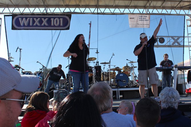 Katie and John Maino on stage