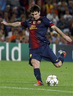 Barcelona's Lionel Messi kicks the ball during their Champions League Group G soccer match against Spartak Moscow at Nou Camp stadium in Bar Barcelona's Lionel Messi kicks the ball during their Champions League Group G soccer match against Spartak Moscow at Nou Camp stadium in Bar