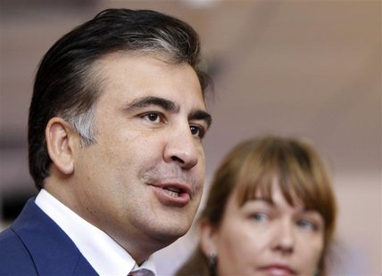 Georgia's President Mikheil Saakashvili talks to the media at a polling station during the parliamentary election in Tbilisi October 1, 2012 Georgia's President Mikheil Saakashvili talks to the media at a polling station during the parliamentary election in Tbilisi October 1, 2012