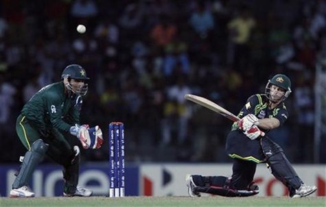 Australia's Matthew Wade (R) plays a shot as Pakistan's wicketkeeper Kamran Akmal watches during their Twenty20 World Cup Super 8 cricket ma Australia's Matthew Wade (R) plays a shot as Pakistan's wicketkeeper Kamran Akmal watches during their Twenty20 World Cup Super 8 cricket ma