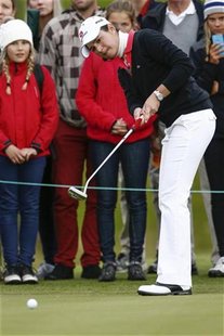 Lorena Ochoa of Mexico putts the ball at the Suzann Pro Golf Challenge in Oslo September 9, 2012. REUTERS/Audun Braastad/NTB Scanpix Lorena Ochoa of Mexico putts the ball at the Suzann Pro Golf Challenge in Oslo September 9, 2012. REUTERS/Audun Braastad/NTB Scanpix
