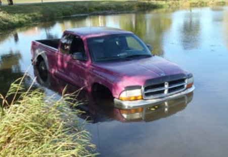 Pick-up truck driven into lake Pick-up truck driven into lake