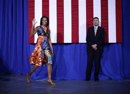 U.S. first lady Michelle Obama arrives to speak at an election campaign rally to re-elect her husband Barack Obama at the University of Mary U.S. first lady Michelle Obama arrives to speak at an election campaign rally to re-elect her husband Barack Obama at the University of Mary