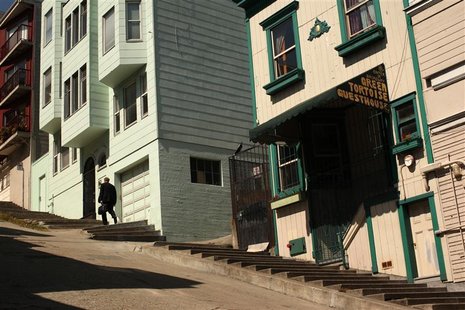 A man climbs a set of stairs built into the sidewalk in the North Beach neighborhood in San Francisco, California May 27, 2012. REUTERS/Robe A man climbs a set of stairs built into the sidewalk in the North Beach neighborhood in San Francisco, California May 27, 2012. REUTERS/Robe