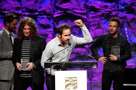 Drummer Ronnie Vannucci Jr. of the rock band The Killers gestures as the band receives the Vanguard Award at the 27th annual ASCAP Pop Music Drummer Ronnie Vannucci Jr. of the rock band The Killers gestures as the band receives the Vanguard Award at the 27th annual ASCAP Pop Music