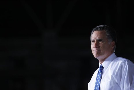 Republican presidential candidate and former Massachusetts Governor Mitt Romney pauses while speaking at a campaign rally in Denver, Colorad Republican presidential candidate and former Massachusetts Governor Mitt Romney pauses while speaking at a campaign rally in Denver, Colorad
