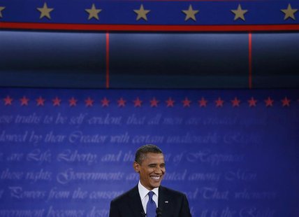 President Barack Obama smiles during the first presidential debate with Republican presidential nominee Mitt Romney (not pictured) in Denver President Barack Obama smiles during the first presidential debate with Republican presidential nominee Mitt Romney (not pictured) in Denver