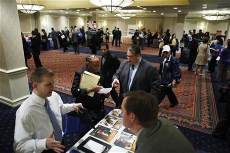 Job seekers speak with with job recruiters while they attend the Coast to Coast job fair in New York, May 7, 2012. REUTERS/Eduardo Munoz Job seekers speak with with job recruiters while they attend the Coast to Coast job fair in New York, May 7, 2012. REUTERS/Eduardo Munoz