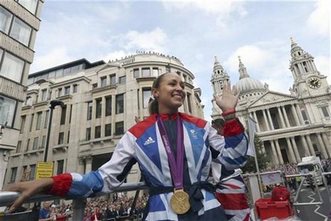 British Olympic heptathlon gold medalist Jessica Ennis waves to the crowd during the London 2012 Victory Parade for Team GB and Paralympic G British Olympic heptathlon gold medalist Jessica Ennis waves to the crowd during the London 2012 Victory Parade for Team GB and Paralympic G