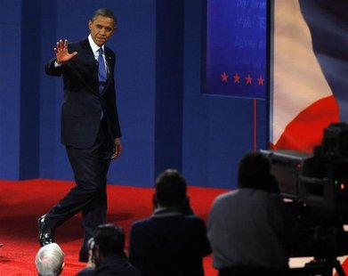U.S. President Barack Obama walks offstage following the first 2012 U.S. presidential debate with Republican presidential nominee and former U.S. President Barack Obama walks offstage following the first 2012 U.S. presidential debate with Republican presidential nominee and former