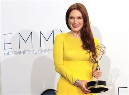 Actress Julianne Moore holds the Emmy award for outstanding lead actress in a miniseries or movie for "Game Change" at the 64th Primetime Em Actress Julianne Moore holds the Emmy award for outstanding lead actress in a miniseries or movie for "Game Change" at the 64th Primetime Em