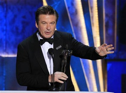Actor Alec Baldwin accepts the award for outstanding performance by a male actor in a comedy series for "30 Rock" at the 18th annual Screen Actor Alec Baldwin accepts the award for outstanding performance by a male actor in a comedy series for "30 Rock" at the 18th annual Screen