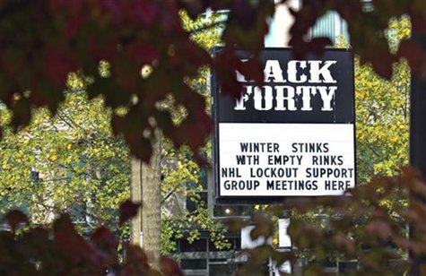 A pub near the home arena of the NHL Vancouver Canucks posts a sign regarding the current league and players dispute in Vancouver, British C A pub near the home arena of the NHL Vancouver Canucks posts a sign regarding the current league and players dispute in Vancouver, British C