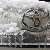 The Toyota logo is seen on a car covered with snow and ice at a parking lot in Almaty February 5, 2010. REUTERS/Shamil Zhumatov The Toyota logo is seen on a car covered with snow and ice at a parking lot in Almaty February 5, 2010. REUTERS/Shamil Zhumatov