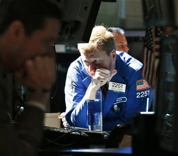 Traders work on the floor of the New York Stock Exchange, July 2, 2012. REUTERS/Brendan McDermid Traders work on the floor of the New York Stock Exchange, July 2, 2012. REUTERS/Brendan McDermid
