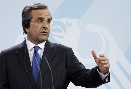 Greek Prime Minister Antonis Samaras addresses a news conference after talks with German Chancellor Angela Merkel in Berlin, August 24, 2012 Greek Prime Minister Antonis Samaras addresses a news conference after talks with German Chancellor Angela Merkel in Berlin, August 24, 2012