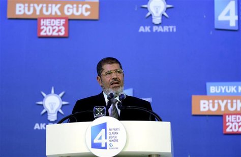 Egypt's President Mohamed Mursi makes a speech during Turkey's Prime Minister Tayyip Erdogan's ruling Justice and Development Party (AKP) co Egypt's President Mohamed Mursi makes a speech during Turkey's Prime Minister Tayyip Erdogan's ruling Justice and Development Party (AKP) co