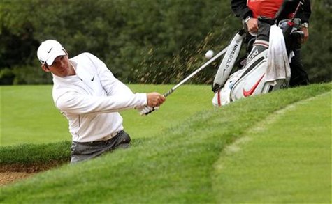 Paul Casey of England hits out of the bunker onto the 13th green during the first round of the European Masters golf tournament in the Swiss Paul Casey of England hits out of the bunker onto the 13th green during the first round of the European Masters golf tournament in the Swiss