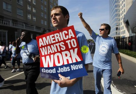 Chris Martin (C) marches with Local 5285 in the Charlotte Labor Day Parade ahead of the Democratic National Convention in Charlotte, North C Chris Martin (C) marches with Local 5285 in the Charlotte Labor Day Parade ahead of the Democratic National Convention in Charlotte, North C
